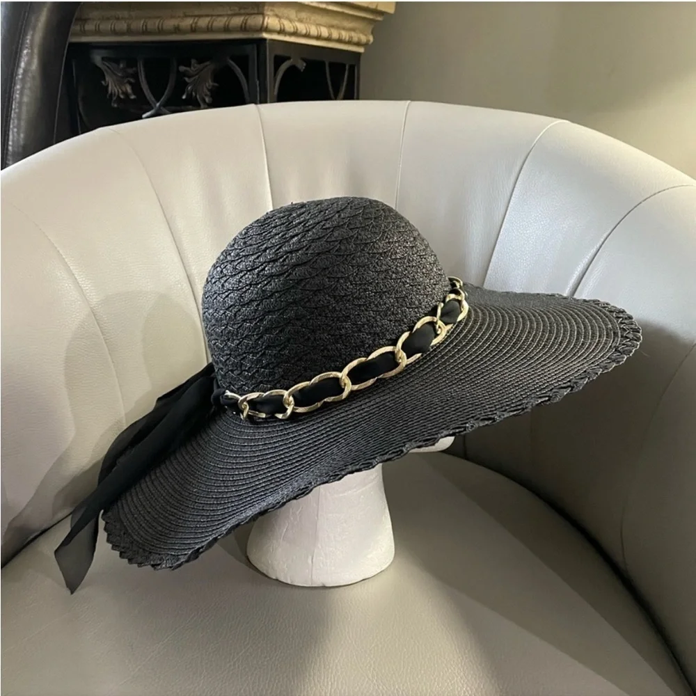 Marcus Adler New York black floppy hat with gold chain and sheer scarf accent